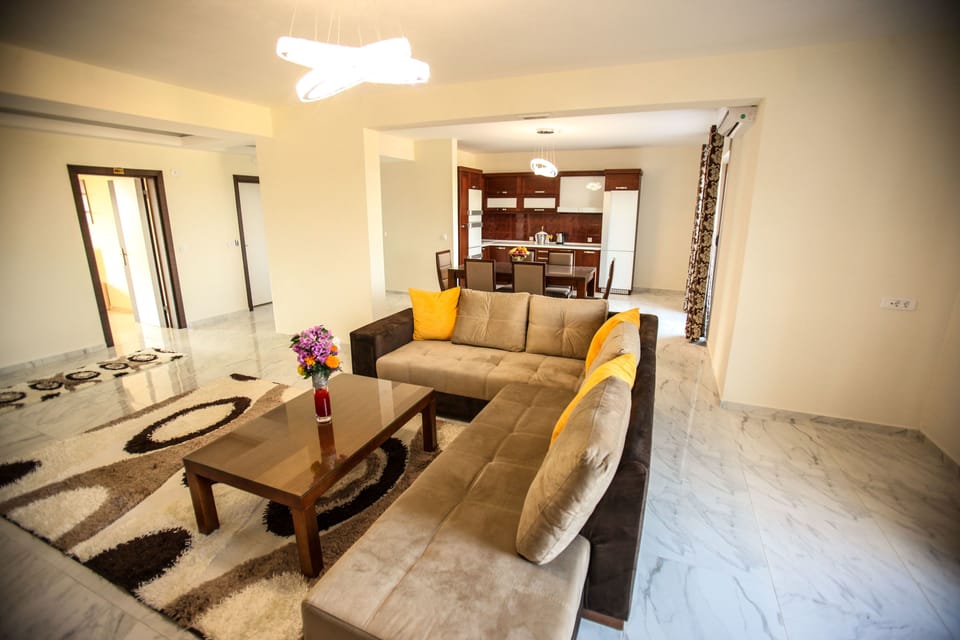 Apartment, 2 Bedrooms, Balcony | Living area | TV