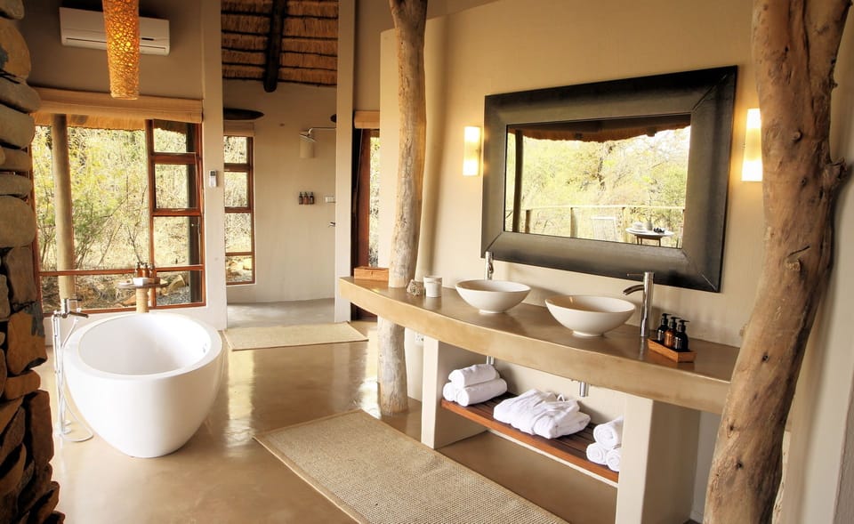 Honeymoon Suite, 1 Bedroom | Bathroom | Separate tub and shower, deep soaking tub, rainfall showerhead