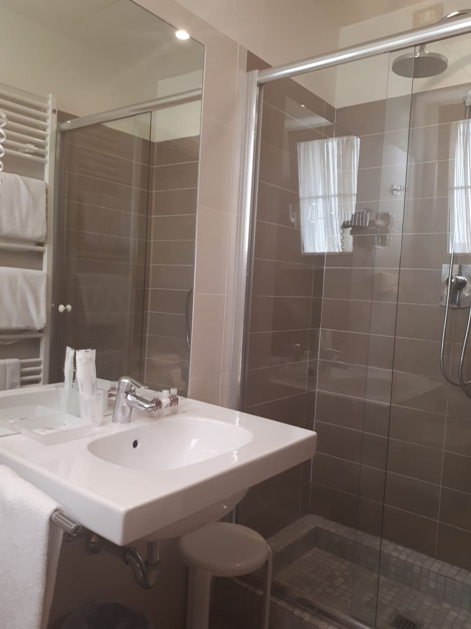 Shower, free toiletries, hair dryer, slippers