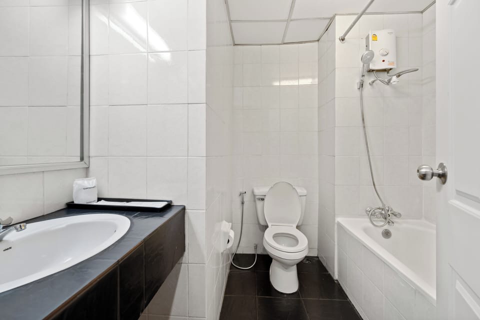 Shower, free toiletries, hair dryer, slippers