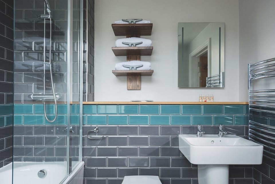 Shower, free toiletries, hair dryer, towels