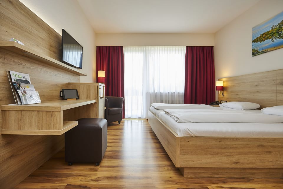Double Room, Balcony | Living area | 82-cm LCD TV with satellite channels, TV