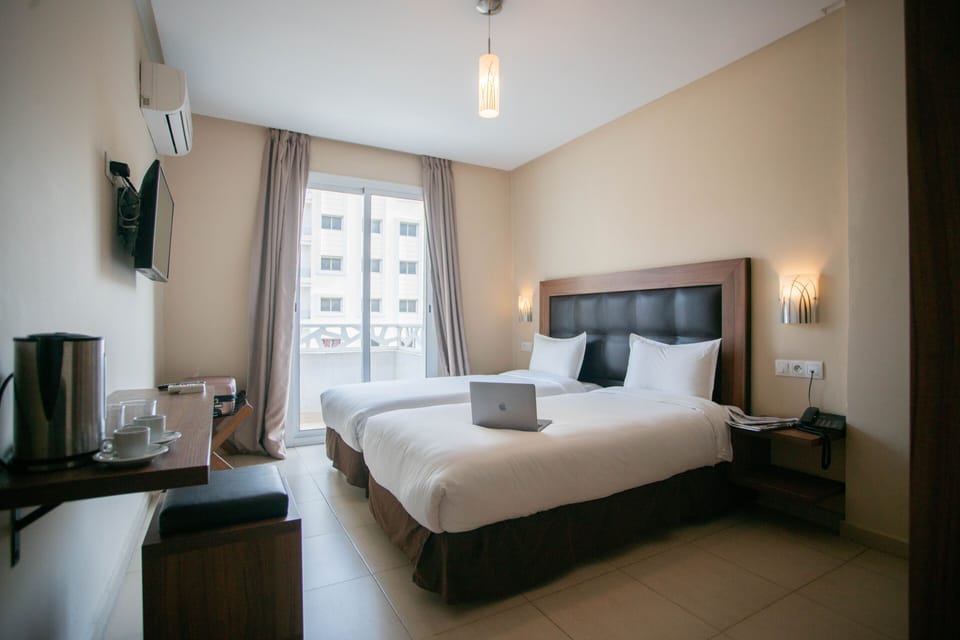 Superior Twin Room | In-room safe, laptop workspace, blackout drapes, iron/ironing board