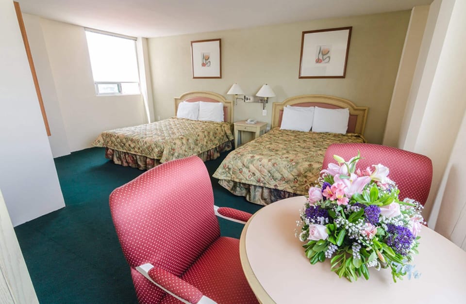 Standard Room, 2 Double Beds | Down comforters, in-room safe, desk, blackout drapes