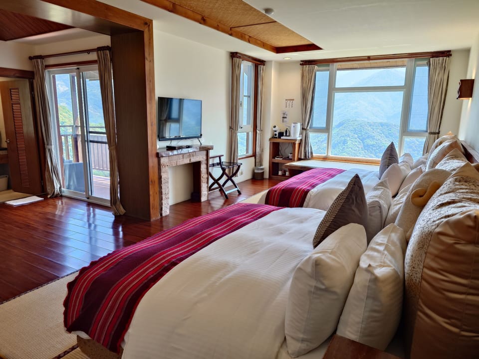 Signature Quadruple Room, 2 Queen Beds, Balcony, Mountain View (Bamboo) | Down comforters, individually furnished, blackout drapes, soundproofing