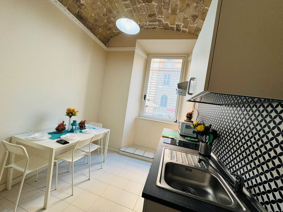 Two-Bedroom Apartment | Private kitchen | Fridge, electric kettle