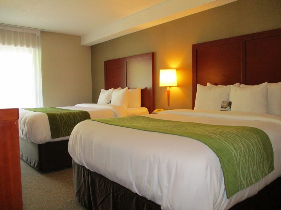 Premium bedding, individually furnished, desk, laptop workspace
