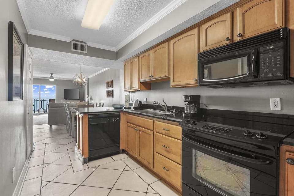 Condo, 2 Bedrooms | Private kitchen | Fridge, microwave, oven, dishwasher