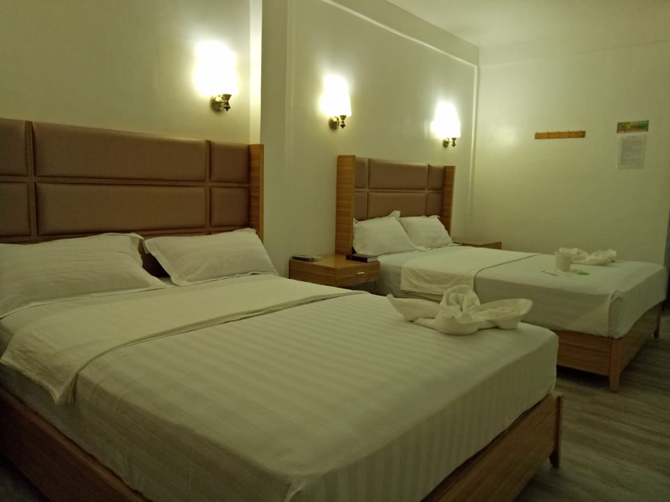 Family Room | Desk, bed sheets