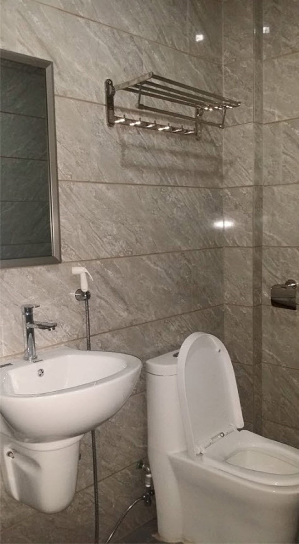 Shower, free toiletries, slippers, towels