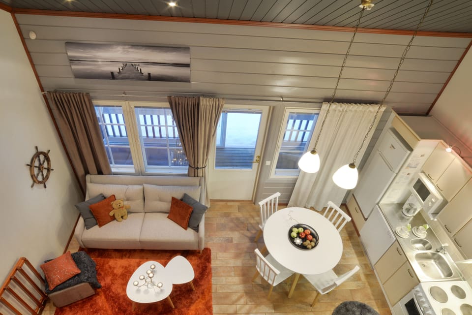 Superior Apartment 2, Sauna | Living area | 48-inch flat-screen TV with cable channels, TV, fireplace