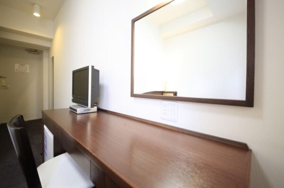 Desk, iron/ironing board (on request), WiFi (free)