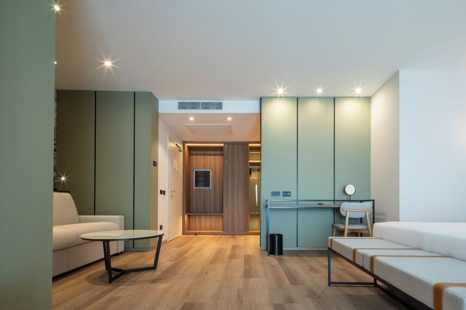 Junior Suite, 1 Queen Bed, Non Smoking, Balcony (with Sofabed) | 1 bedroom, down comforters, minibar, in-room safe