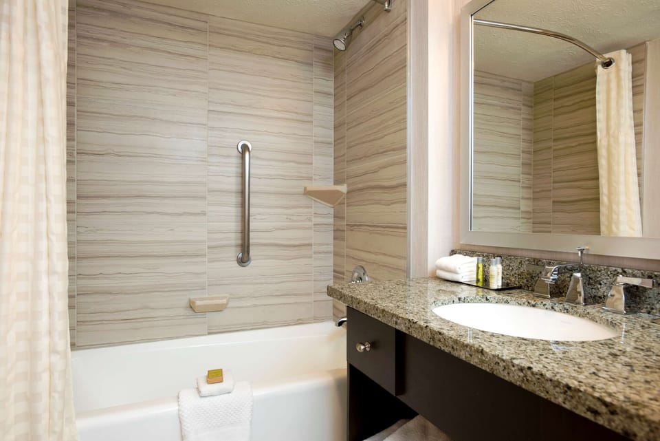Shower, eco-friendly toiletries, hair dryer, towels