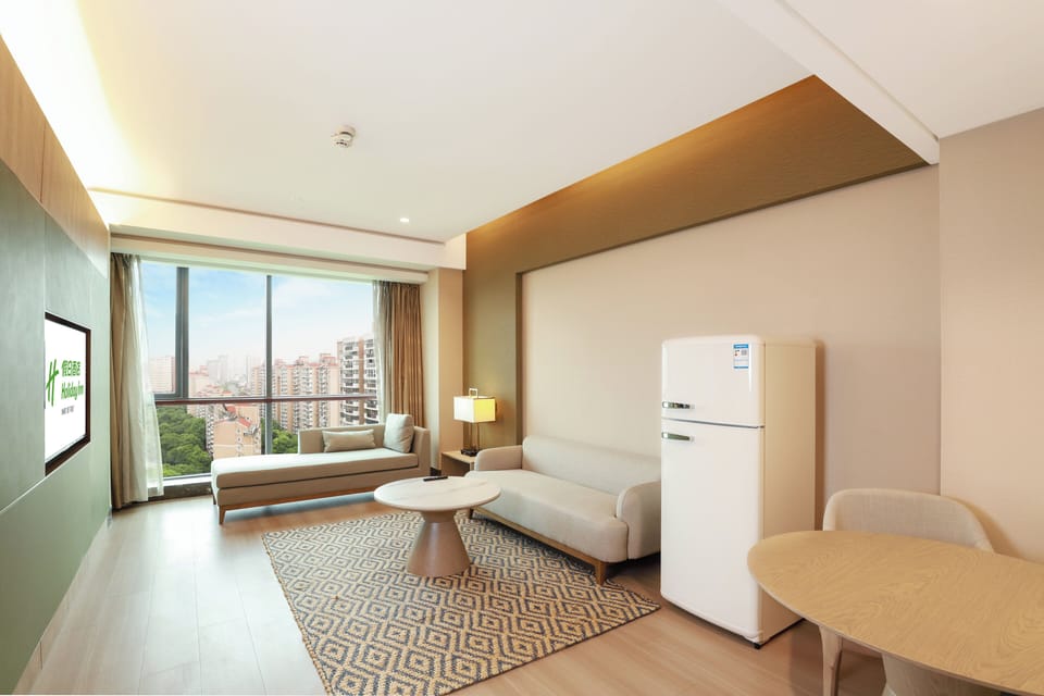 Suite, 1 King Bed | Minibar, in-room safe, desk, soundproofing