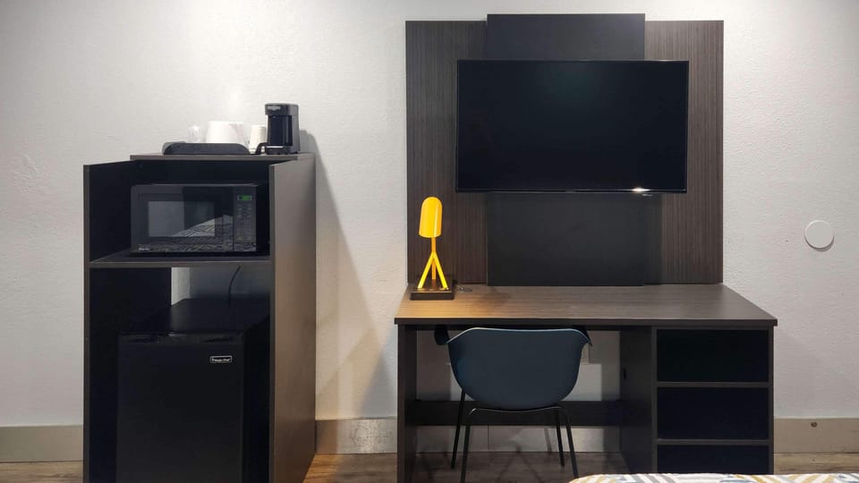 Desk, blackout drapes, iron/ironing board, free WiFi