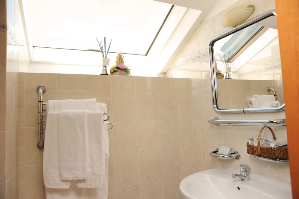 Bathroom | Shower, hair dryer, bidet, towels