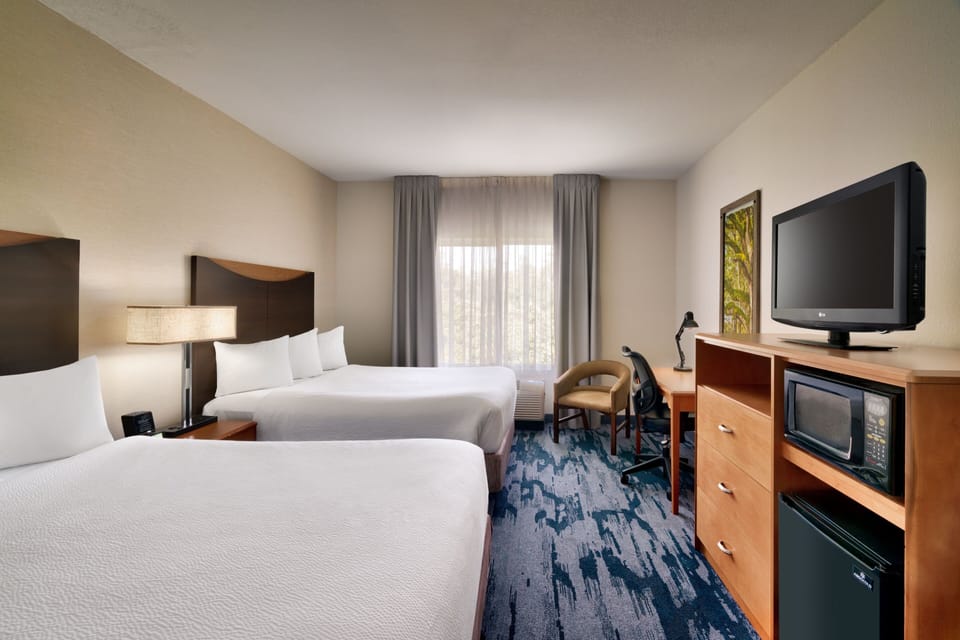 Premium bedding, individually furnished, desk, laptop workspace