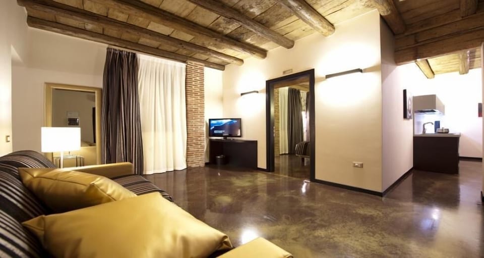Apartment, 1 Bedroom | Minibar, in-room safe, desk, soundproofing