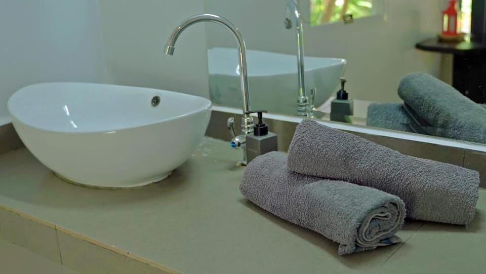 Shower, free toiletries, towels, soap