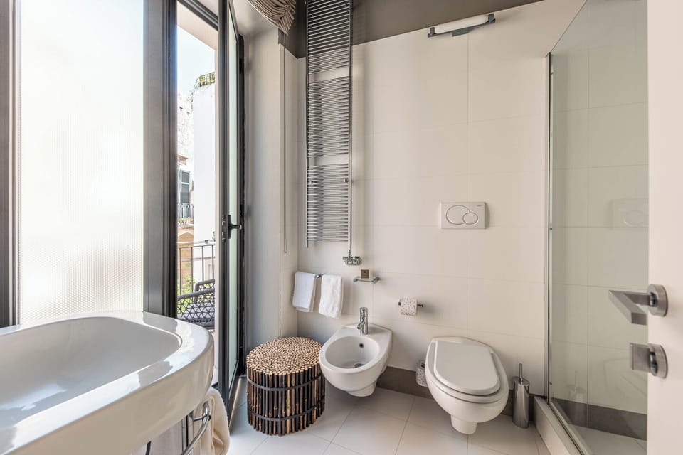 Shower, free toiletries, hair dryer, towels