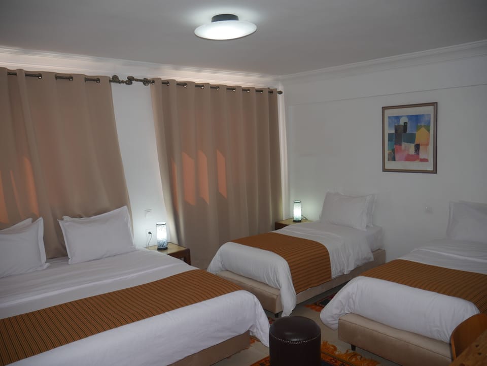 Family Room | 1 bedroom, minibar, blackout drapes, free WiFi