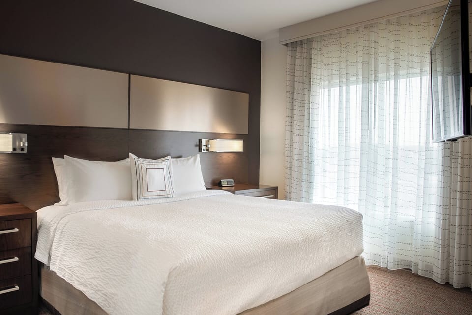Suite, 2 Bedrooms | Desk, blackout drapes, iron/ironing board, free cribs/infant beds