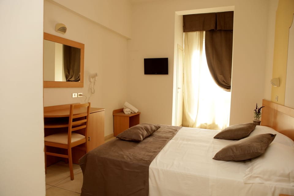 Family Room | Premium bedding, in-room safe, desk, blackout drapes