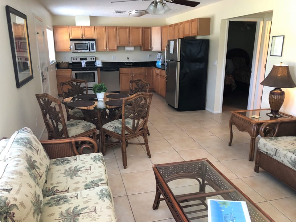 Family Villa, 2 Bedrooms | Living room | 32-inch LED TV with cable channels, TV, books