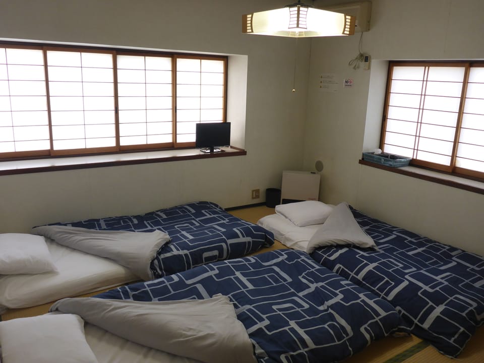 Japanese-Style Triple Room with Shared Bathroom | Free WiFi, bed sheets
