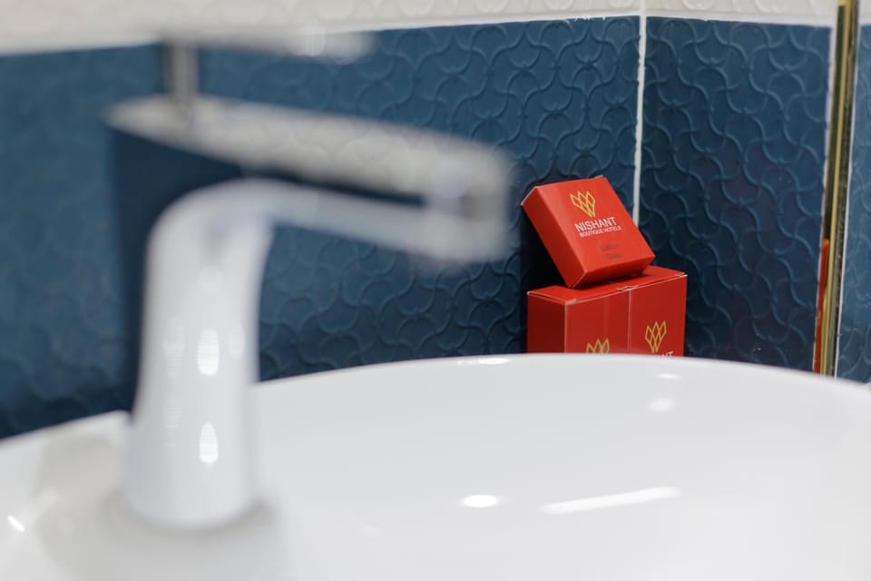 Shower, free toiletries, hair dryer, slippers