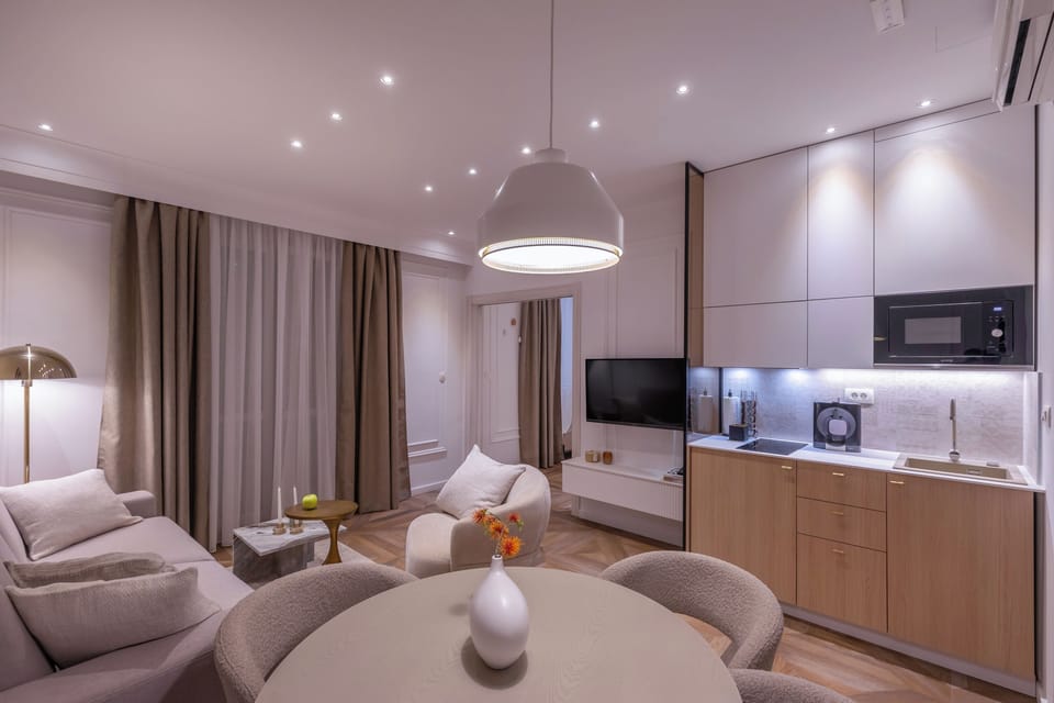 Deluxe Suite, Balcony, Sea View | Living area | Flat-screen TV