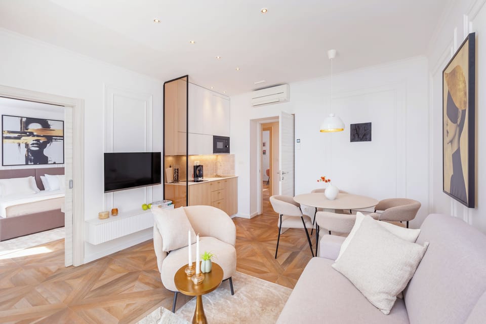 Deluxe Suite, Balcony, Sea View | Living area | Flat-screen TV