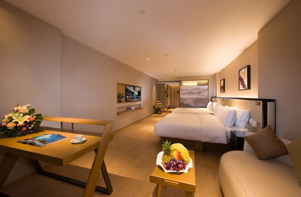 Family Room | Minibar, desk, blackout drapes, iron/ironing board