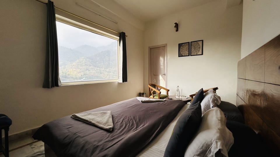 Deluxe Double Room | Down comforters, desk, laptop workspace, blackout drapes