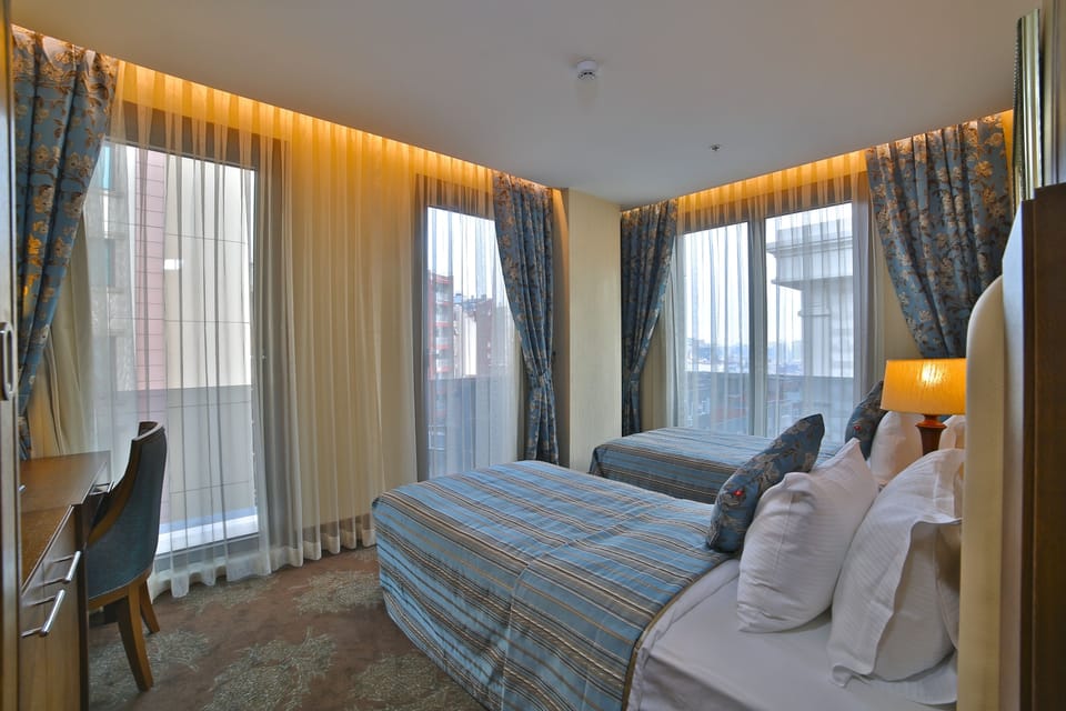 Family Suite, Connecting Rooms | Premium bedding, minibar, in-room safe, desk