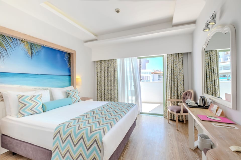 Double Room, Balcony | Minibar, desk, free cribs/infant beds, WiFi