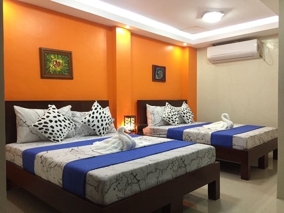Family Room | Iron/ironing board (on request), WiFi (free), bed sheets