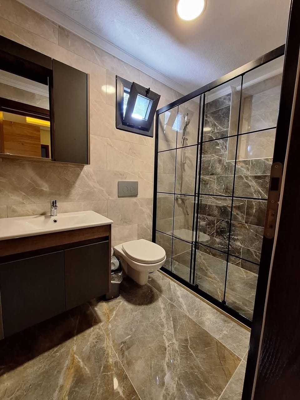 Triple Room | Bathroom | Shower, hair dryer (on request), towels
