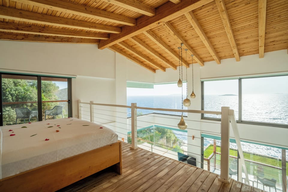 Gallery Duplex, Private Pool, Sea View | Minibar, in-room safe, individually decorated, soundproofing