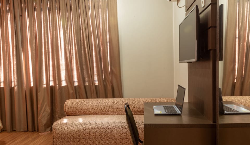 Minibar, desk, laptop workspace, iron/ironing board