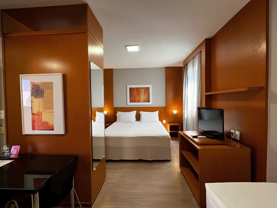 Superior Triple Room | Minibar, in-room safe, blackout drapes, soundproofing