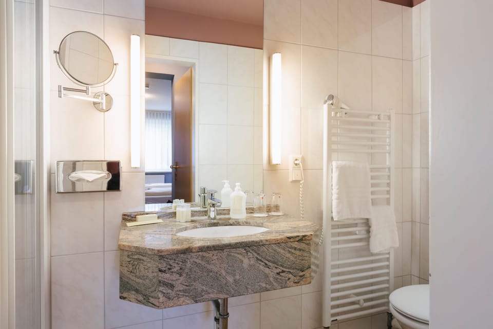 Double Room, Oceanfront | Bathroom | Shower, free toiletries, hair dryer, towels