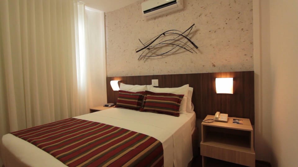 Flat Luxo Casal | Minibar, in-room safe, desk, soundproofing