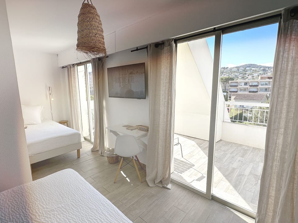 Triple Room, Terrace | In-room safe, blackout drapes, soundproofing, iron/ironing board