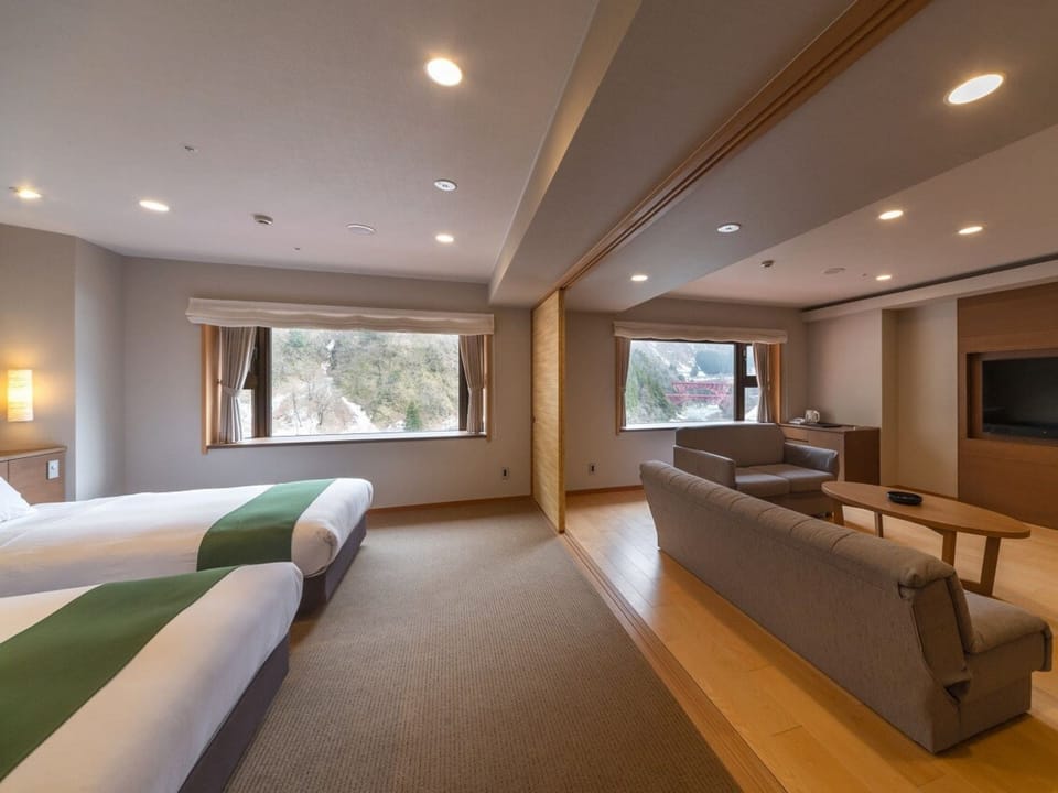 Main Tower Deluxe Western Room River side, Non Smoking | In-room safe, desk, free WiFi, bed sheets