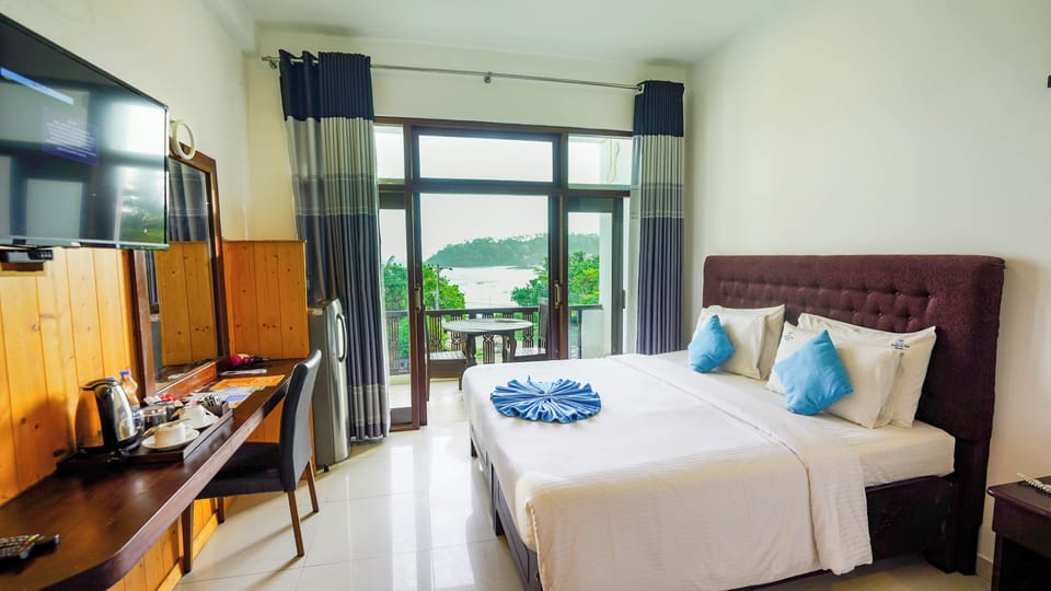 Family Room, Balcony, Sea View | 1 bedroom, free minibar, in-room safe, individually furnished