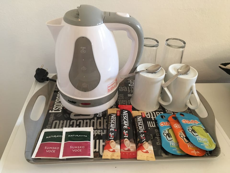 Double Room, Balcony | Coffee and/or coffee maker