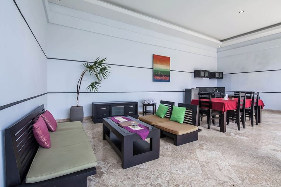 Two Bedroom Villa with Private Pool | Living area | 32-inch flat-screen TV with cable channels, LED TV