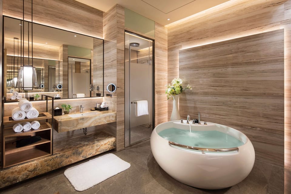 King One Bedroom Presidential Suite | Bathroom | Separate tub and shower, deep soaking tub, rainfall showerhead